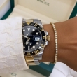 Discontinued Rolex GMT MASTER II - złoto, stal i czarny cyferblat