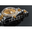 Rolex Datejust 36 z brylantowym pierścieniem, złoty cyferblat